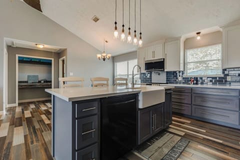 Gourmet Kitchen: Stylish finishes, ample space, and stunning views—perfect for culinary adventures!