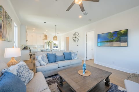 Living room equipped with 65 inch Smart TV