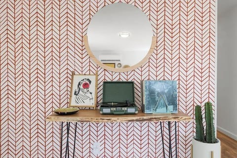 DJ Booth, complete with a record player and some of your fave hits.