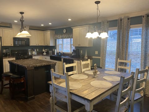 Walk straight into the central living area/kitchen. 