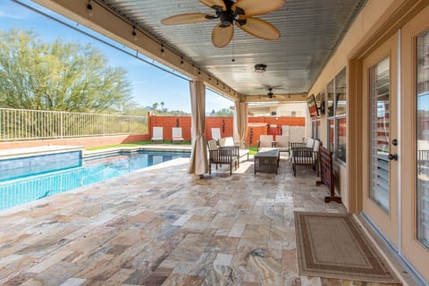 Outdoor pool, a heated pool, sun loungers