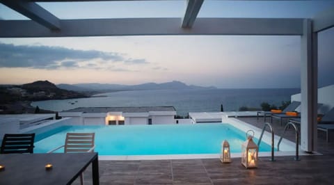 An infinity pool, sun loungers