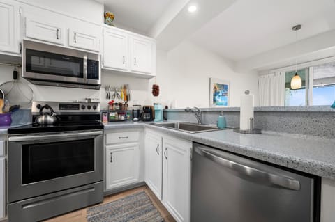 Kitchen open to dining area.