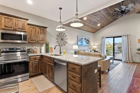 Right out on the deck is a new grill to cook dinner on along with a large table for eating. Enjoy wonderful sunsets and fireworks in the summer from town. 