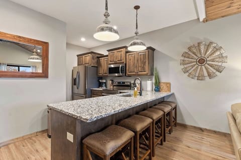 Beautiful, fully stocked kitchen with everything you need to provide a meal for your family. Plus 5 bar stools for additional seating.