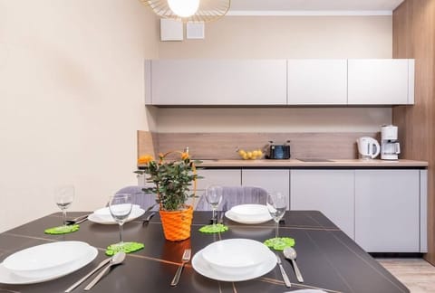 Fully equipped kitchenette with a dining area