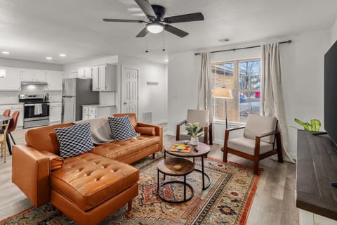 Open floor plan connecting the living area and kitchen—perfect for gathering with friends and family.