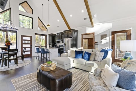 Living Room: Bright and airy retreat with stunning views, perfect for gathering and relaxation!