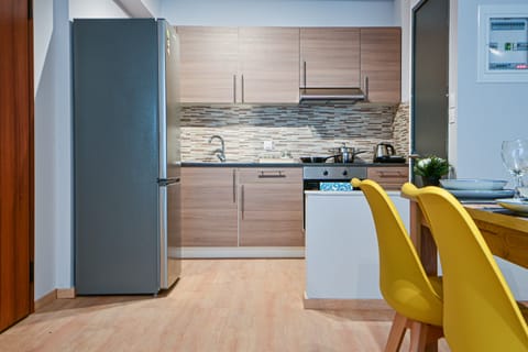 Fridge, oven, electric kettle, toaster