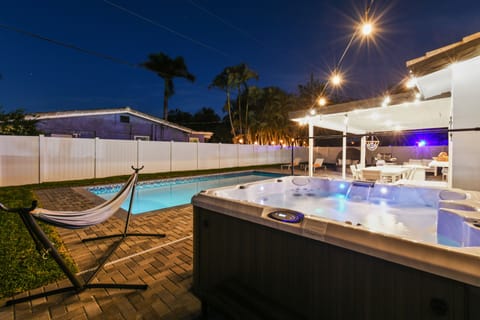 Enjoy yourself in the Jacuzzi at night time.