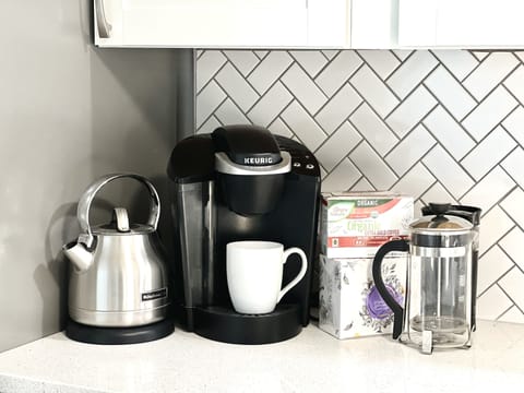 Coffee station, with drip coffee maker, Keurig, and french press.
