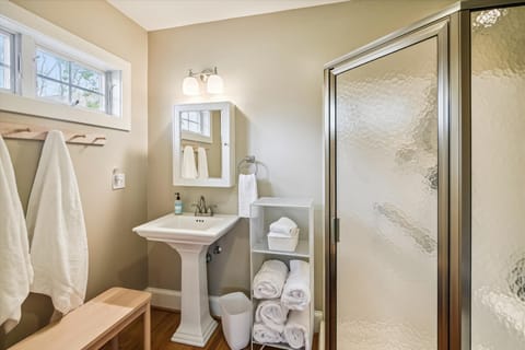 Combined shower/tub, hair dryer, towels, soap