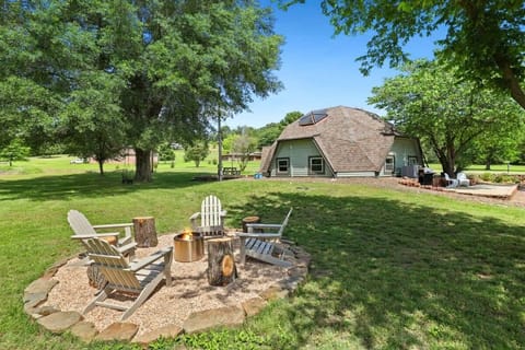 Outdoor amenities include a fire pit with Solo stove and seating, an acre of yard space, yard games, a grill, outdoor seating, and tree swing.