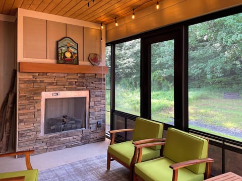Sunroom Fireplace will keep you warm during those cool mountain days & nights.