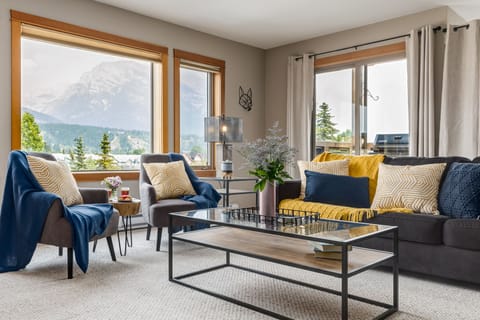 Relax in this modern furnished condo with views of the Rockies.