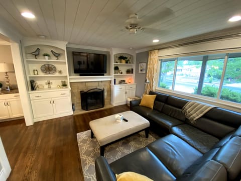 Living room with smart TV and Roku.