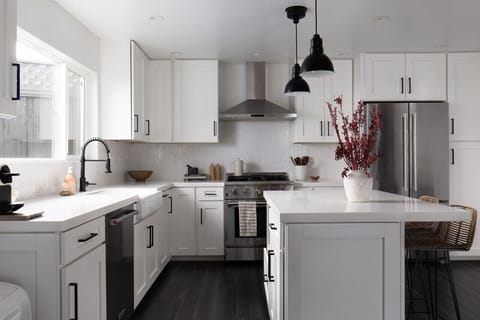 Large open Kitchen Custom designed and built with Stainless Steel Appliances and Modern finishes.