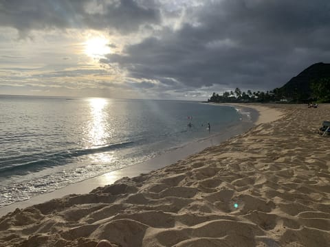 On the beach, sun loungers, beach towels