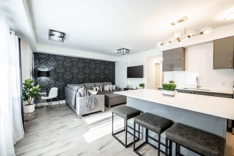 Modern bright multi-functional living room & kitchen.