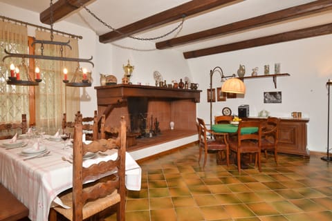 The dining area close to the fireplace