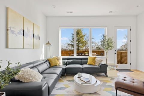 Living room with luxurious sofa and amazing view! First floor.
