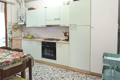 Fridge, oven, dining tables