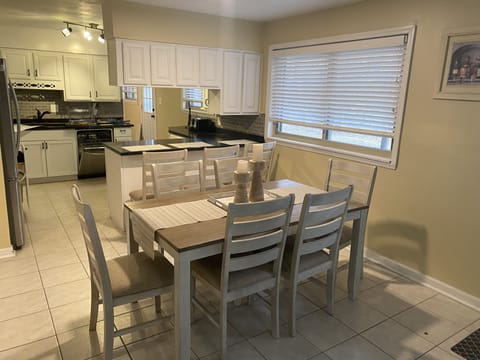 Dining Area Sits up to 6 with Breakfast Bar Seating