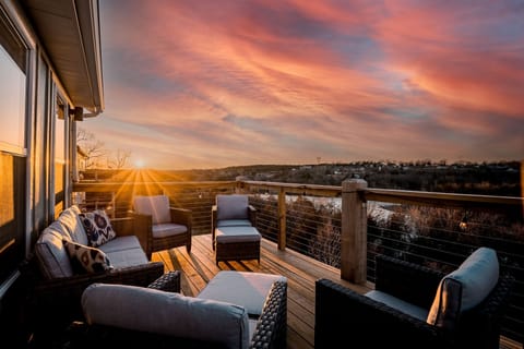 Enjoy a beautiful sunset over Table Rock Lake on the top deck