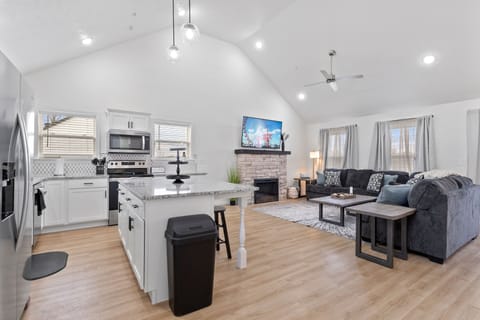 Open space kitchen, living room, and dining room on the main floor