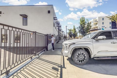 The gate for the private parking with keypad entry.