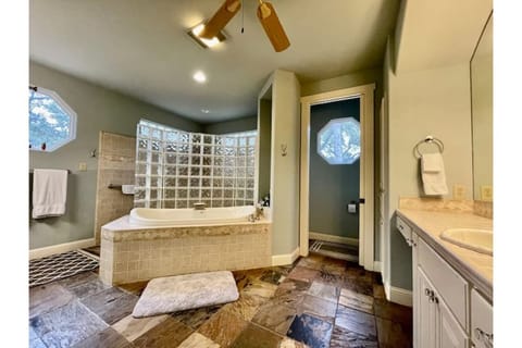 Shower, jetted tub, hair dryer, towels