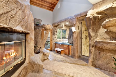 Relax in the indoor hot spa, a cozy and peaceful space inside the home designed for comfort and relaxation after a long day of exploring, adventure, or simply enjoying a quiet getaway.