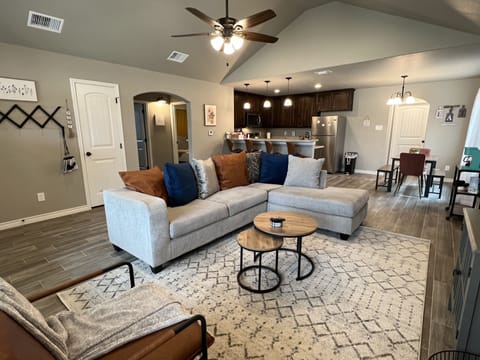 Relax and enjoy coffee, games, or watch TV & movies on our 60 inch Roku TV