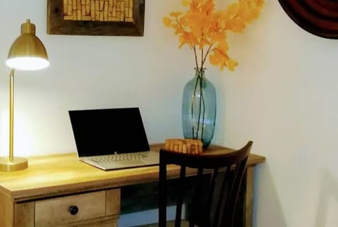 The master bedroom has a desk for you to do your work.