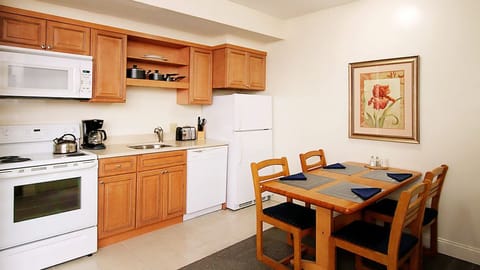 Full kitchen and dining area