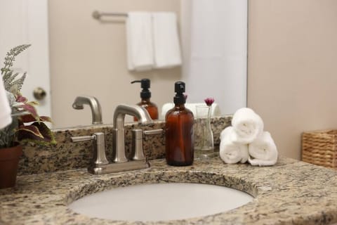 Bathtub, hair dryer, towels