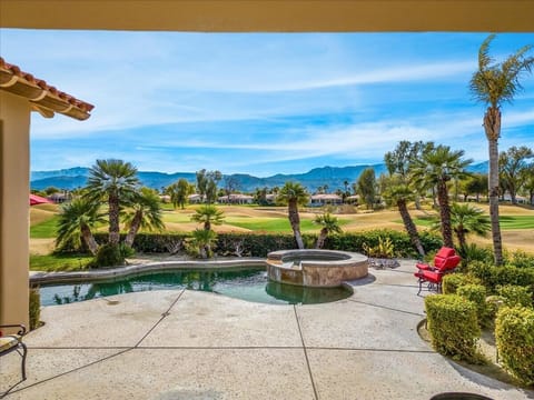 Outdoor pool, a heated pool, sun loungers