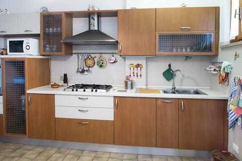 Fridge, oven, dining tables