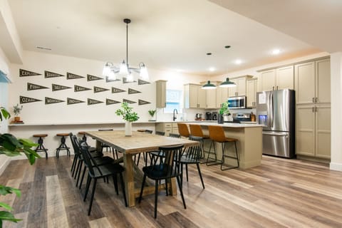 Dining room with tons of seating with fully equipped kitchen