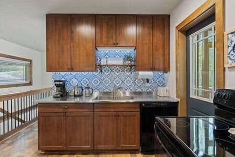 Drip coffee, kettle, French press and coffee grounds provided.