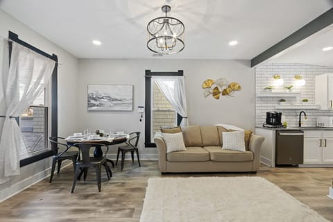 Chic dining table comfortably sits 3