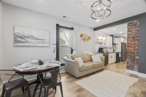 Ideal gathering space provided by a soft chenille sofa & accent chairs