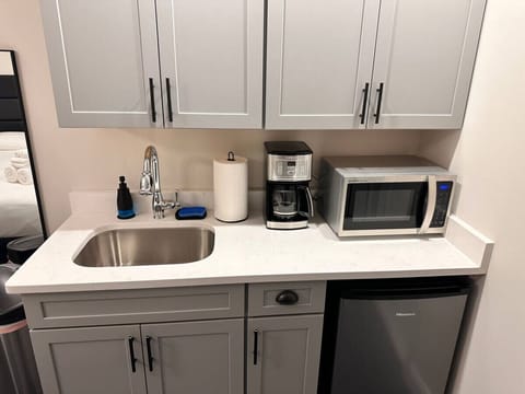 Microwave, coffee/tea maker, cookware/dishes/utensils