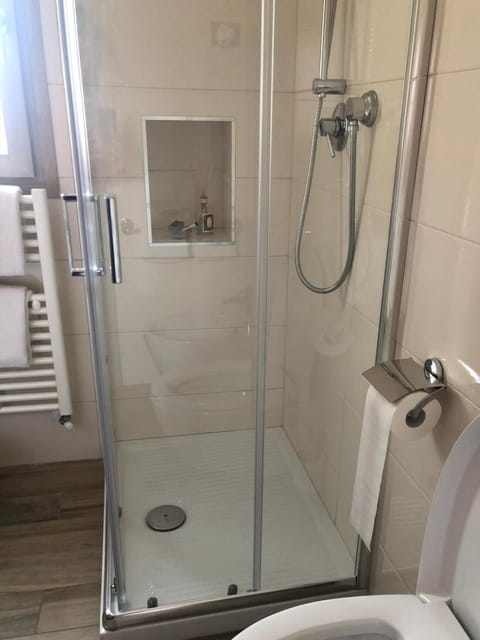 Combined shower/tub, hair dryer