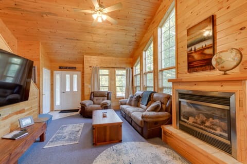 TV, fireplace, books