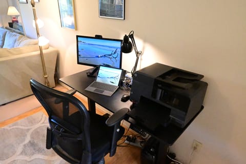 Computer workstation with adjustable height desk, printer, 27" HDTV/Monitor, etc
