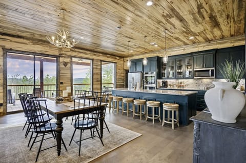Open concept kitchen and dining area with long-range views.