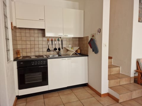 Cabinetry, Countertop, Kitchen Sink, Sink, Kitchen Stove, Kitchen Appliance, Tap, Kitchen, Wood, Building