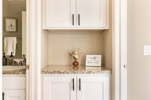 The nook in the entry to drop your purse or keys.