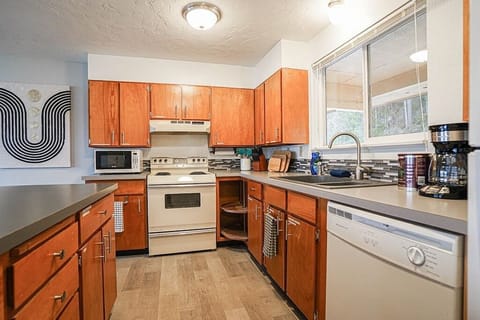 The fully equipped kitchen has everything you need to whip up delicious meals, from cookware to utensils, and more. Whether you're a seasoned chef or just starting out, you'll feel right at home here.